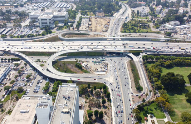 West Los Angeles Cityscape and the traffic on interstate 405 - aerial view Aerial view of West  Los Angeles with traffic on the 405 Freeway at the Wilshire lvd. highway 405 photos stock pictures, royalty-free photos & images