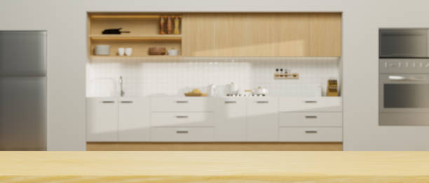 istock Empty wooden tabletop for montage over spacious modern contemporary kitchen room 1347413968