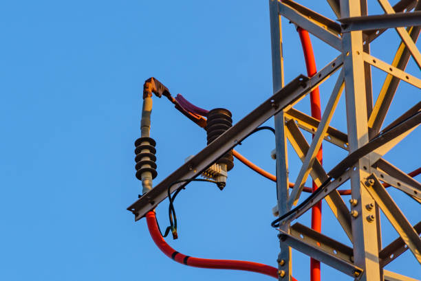 istock High voltage towers against blue sky 1347418173