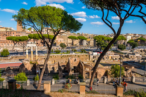 Rome, Italy, October 16 -- A suggestive and detailed image of the Roman Forum taken from the terrace of the Campidoglio (Roman Capitol) on the Capitoline Hill, in the historic heart of the Eternal City. In the foreground the Forum of Caesar with the remains of the Temple of Venus Genetrix, while in the background the Forum of Trajan. In the center the Fori Imperiali Boulevard, which connects the Colosseum with the central square of Piazza Venezia. The Roman Forum, one of the largest archaeological areas in the world, represented the political, legal, religious and economic center of the city of Rome, as well as the nerve center of the entire Roman civilization. In 1980 the historic center of Rome was declared a World Heritage Site by Unesco. Image in high definition format.