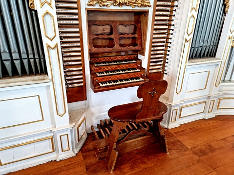 Part of a group of keyboards and stop buttons of an pipe organ, a classical musical instrument