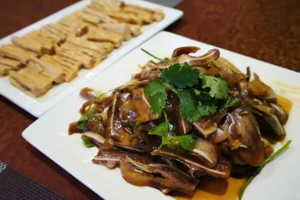 Photo of Stir fry crispy pig ears with deep fried soy tofu, Yunnan Chinese food