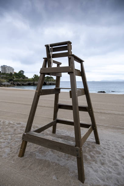 istock Lifeguard chair on the beach 1347426145