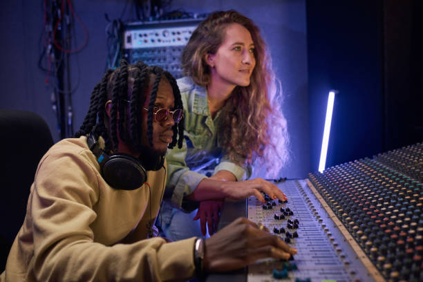 istock Couple in the music studio 1347426264