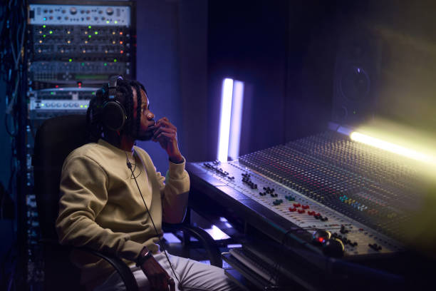 istock Talented African man recording music at studio 1347426442
