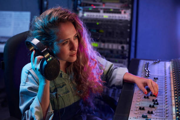 istock Woman working in digital recording studio 1347426507