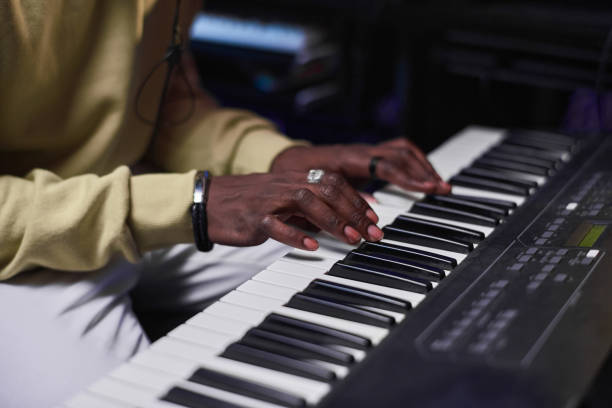 istock Musician playing electric piano 1347426548