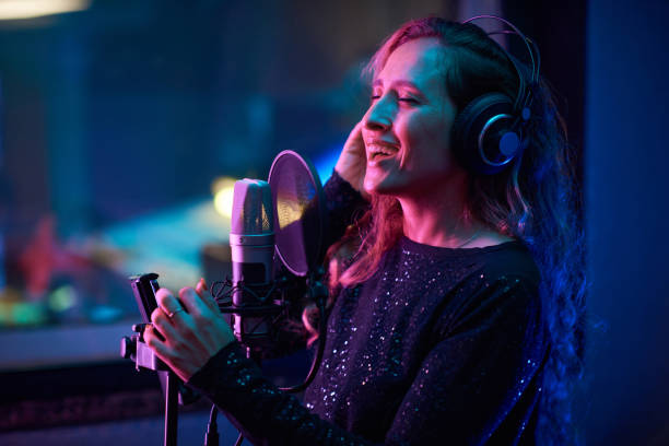 istock Singer recording a new song 1347426565