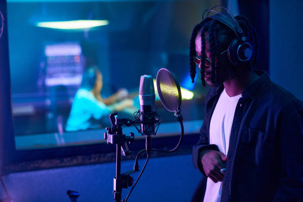 istock African singer singing in the studio 1347426598