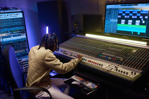 istock Producer working in digital recording studio 1347426674