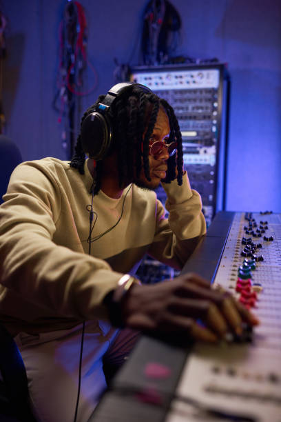 istock Musician creating new songs in studio 1347426696
