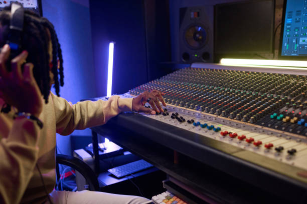 istock Male sound operator in audio recording studio 1347426724