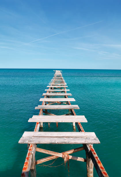 istock Path to the sea with broken planks 1347431170