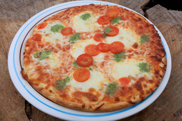 istock pizza caprese with basil and cherry tomatoes 1347432867