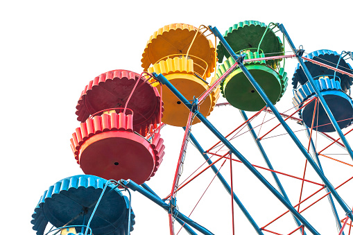 Colorful empty cabins of a Ferris wheel isolated on white