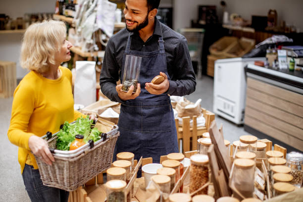 istock Customers buying in a organic grocery store 1347435037