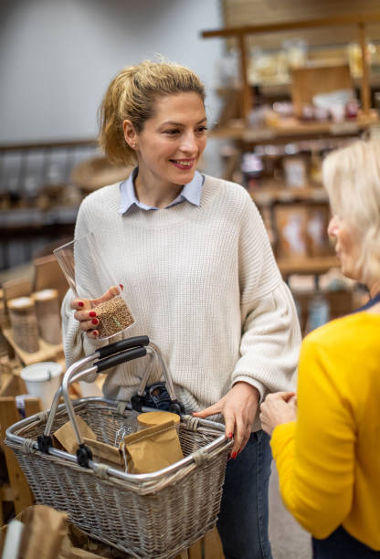 istock Customers buying in a organic grocery store 1347435442