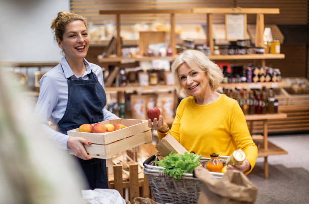 istock Customers buying in a organic grocery store 1347436578