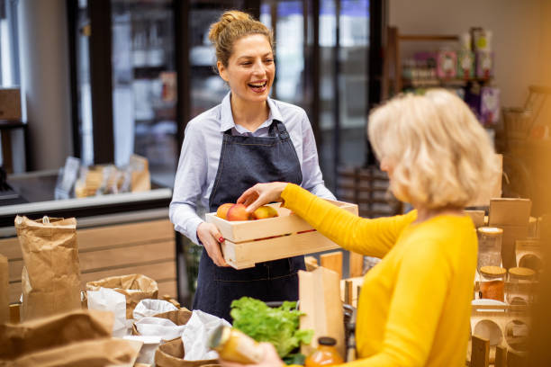 istock Customers buying in a organic grocery store 1347436772