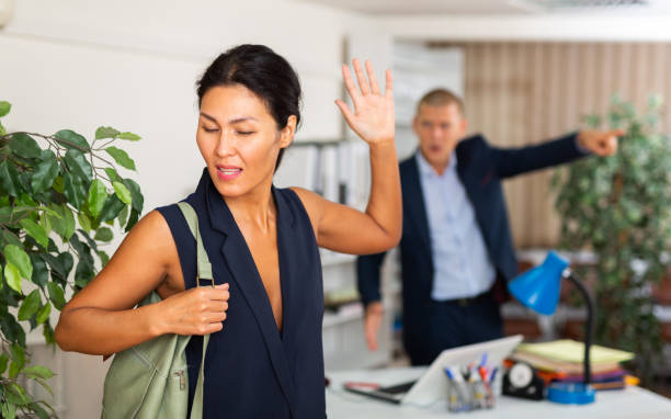 istock Upset asian female employee manager at working place 1347439049