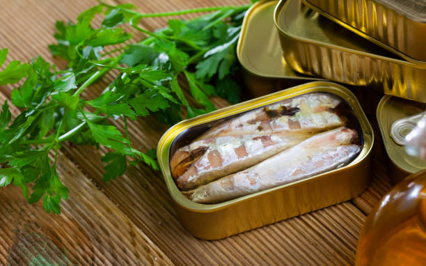 istock Preserved mackerel fish on wooden table 1347442546