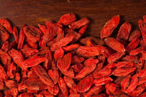 istock Goji berries on dark wooden surface 1347442580