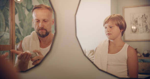 istock Father and son having fun shaving. Quality time with kid 1347445603