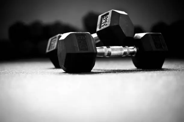 Dumbbells on the floor in a gym