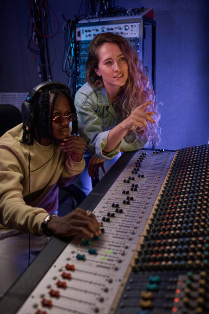 istock People recording a song in the studio 1347446760