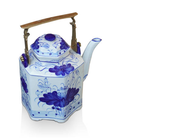 istock white and blue ceramic teapot on white background, object, decoration, copy space 1347448037
