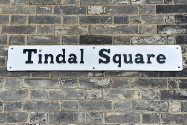 istock close up oblong metal sign with words printed on - Tindal Square. 1347449801