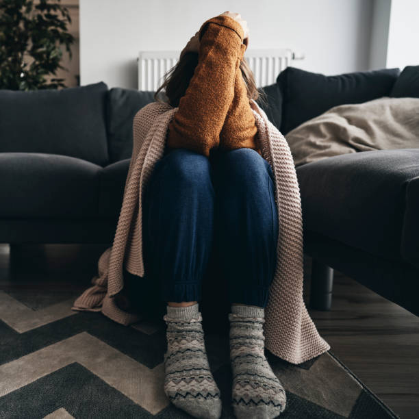 istock Sitting woman has mental illness 1347449970