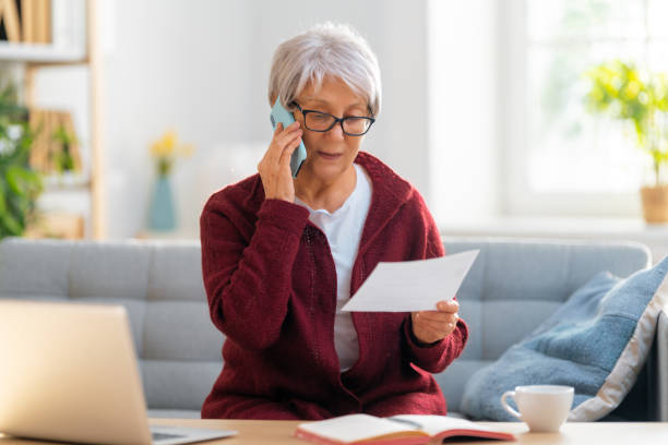 istock woman with a paper receipt 1347450367