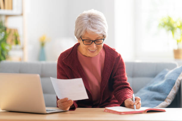 istock woman with a paper receipt 1347451273