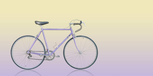istock side view violet bicycle on yellow and violet background, object, transportation, sport, livestyle, copy space 1347451350