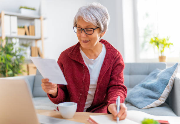 istock woman with a paper receipt 1347451474