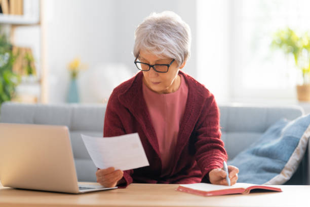 istock woman with a paper receipt 1347451644