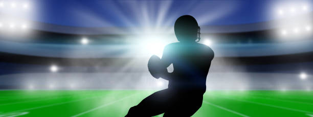 istock American Football player on stadium background. 1347451726
