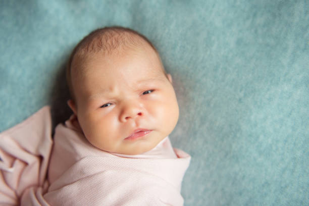 istock Newborn baby enthusiastically looking. Close up 1347453550