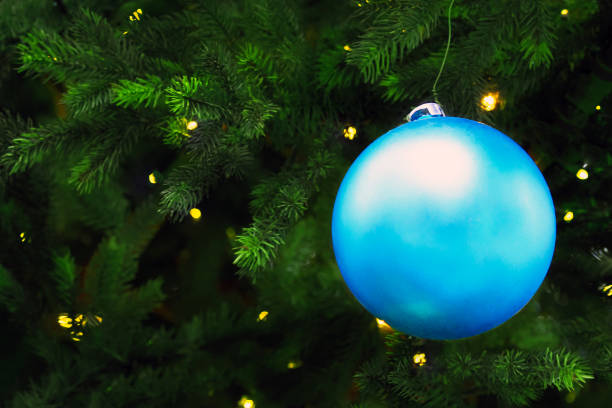 Blue ball for christmas day. Christmas tree and decoration background