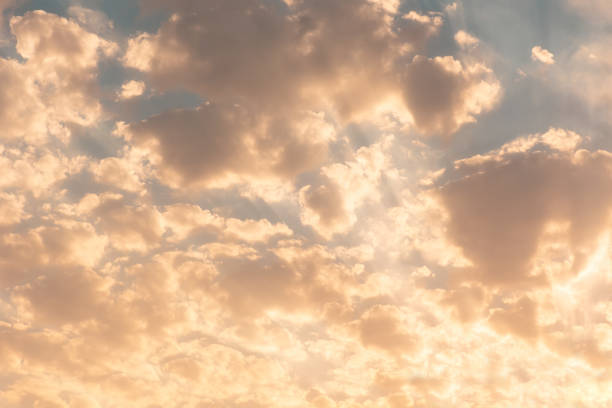 istock Beautiful golden cloudscape in sky. Copy space 1347455792