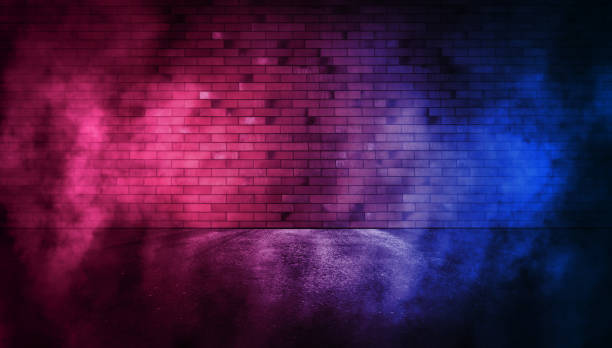 istock Rays neon light on neon brick wall. Empty scene. Neon reflections on wet asphalt. Cyberpunk background with copy space. 1347457762