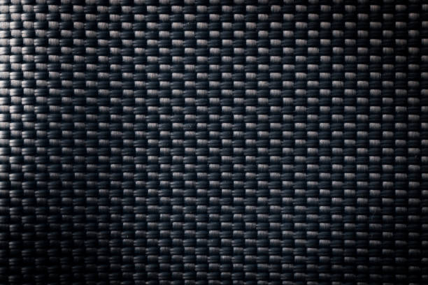 istock Mesh black texture. Dark polyester fiber material for sport cloth or abstract weave background. Synthetic pattern for backpacks and sports equipment. 1347459284