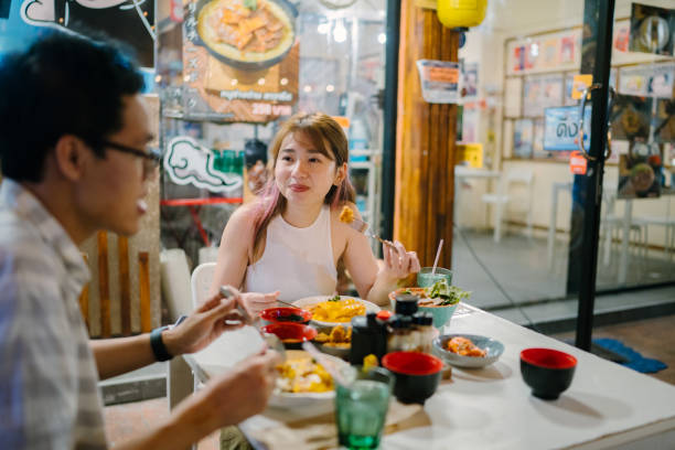 istock Meet up with an old friend for dinner outside. 1347459354