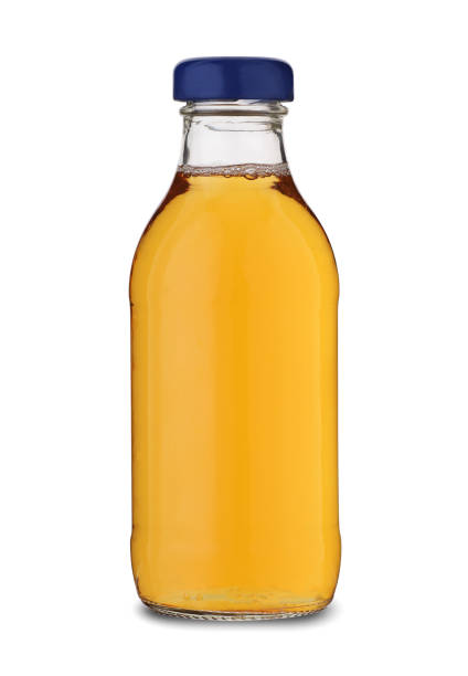 istock glass small bottle with juice 1347462247