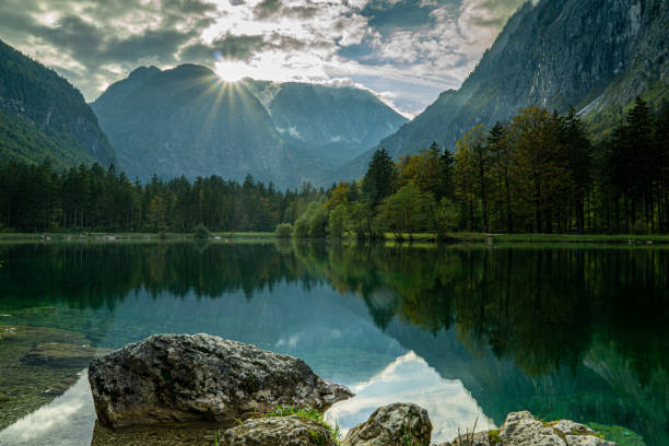 istock Sunset on the mountain lake 1347464409