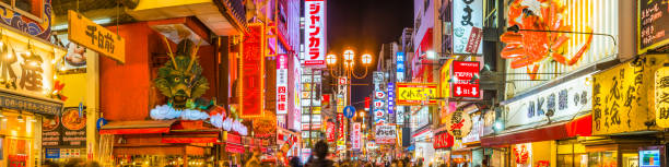 istock Japan crowded streets neon night restaurants and bars panorama Osaka 1347464644