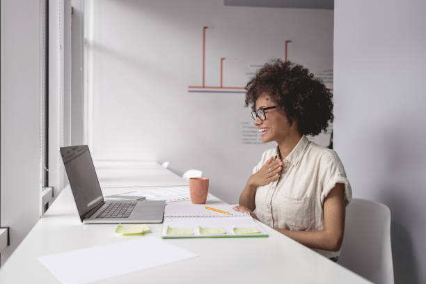 istock Happy multiethnic woman talking and showing sign language 1347470212