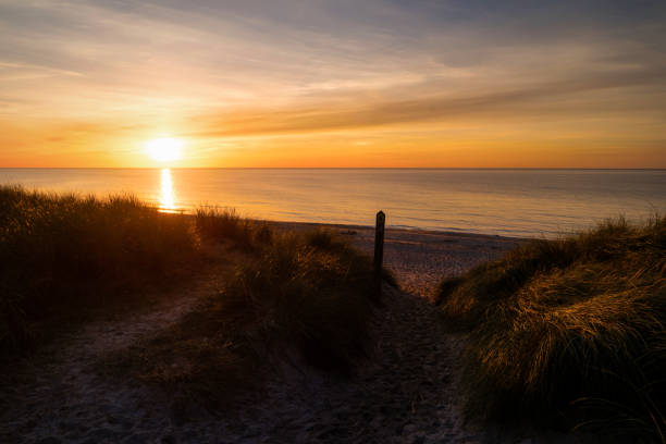 istock Sunset on the beach of Ahrenshoop in Germany 1347470880