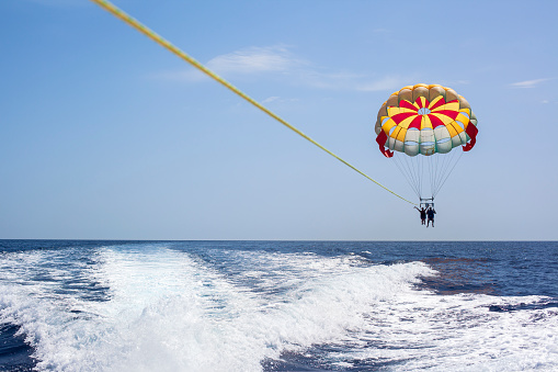 attraction parachute over the sea